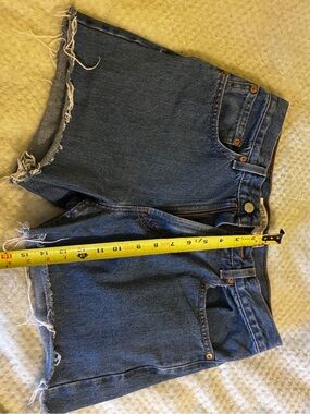 Levi's Raw Hem Mid-Blue Denim Cutoff Shorts